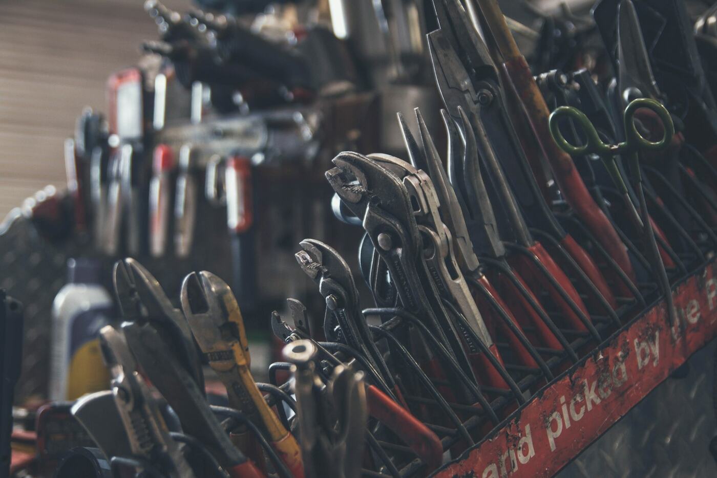 A rack of well used hand tools in the Ashdown workshop